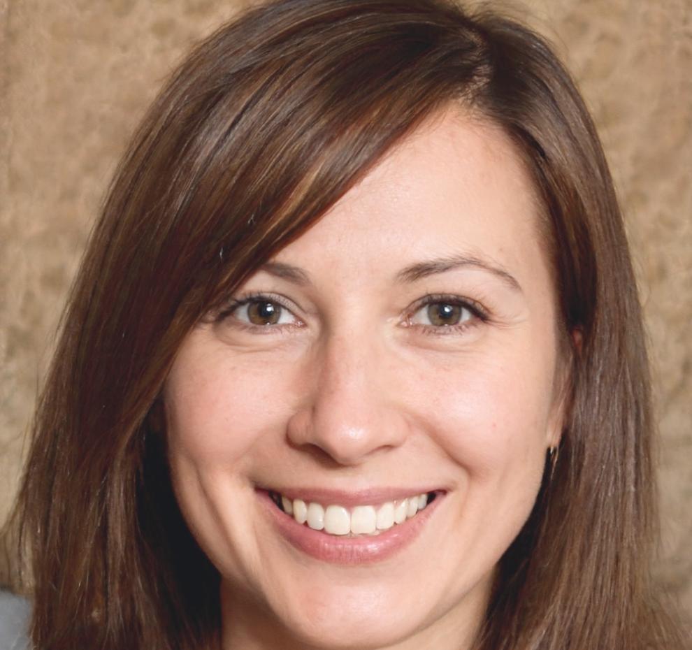 Portrait professionnel de Céline, dirigeante d'entreprise souriante